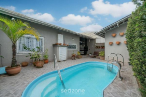 Casa com Piscina e Churrasqueira em Penha TZS210